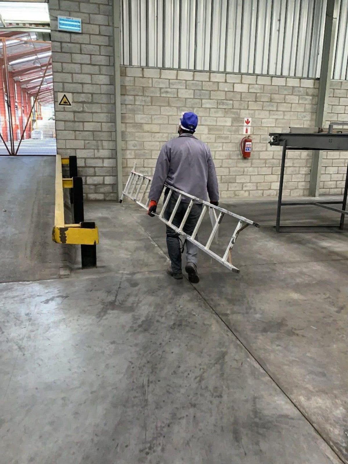An ASC Pest Control technician servicing a commercial warehouse in South Africa