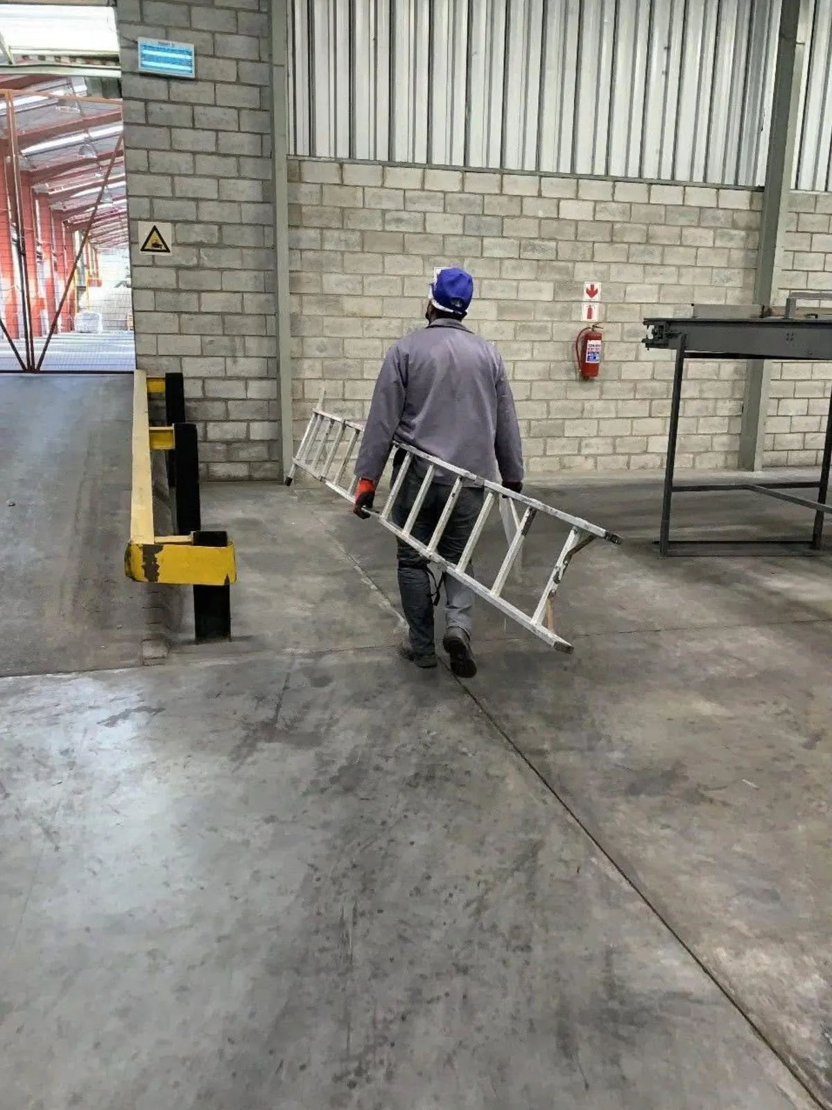An ASC Pest Control technician servicing a commercial warehouse in South Africa